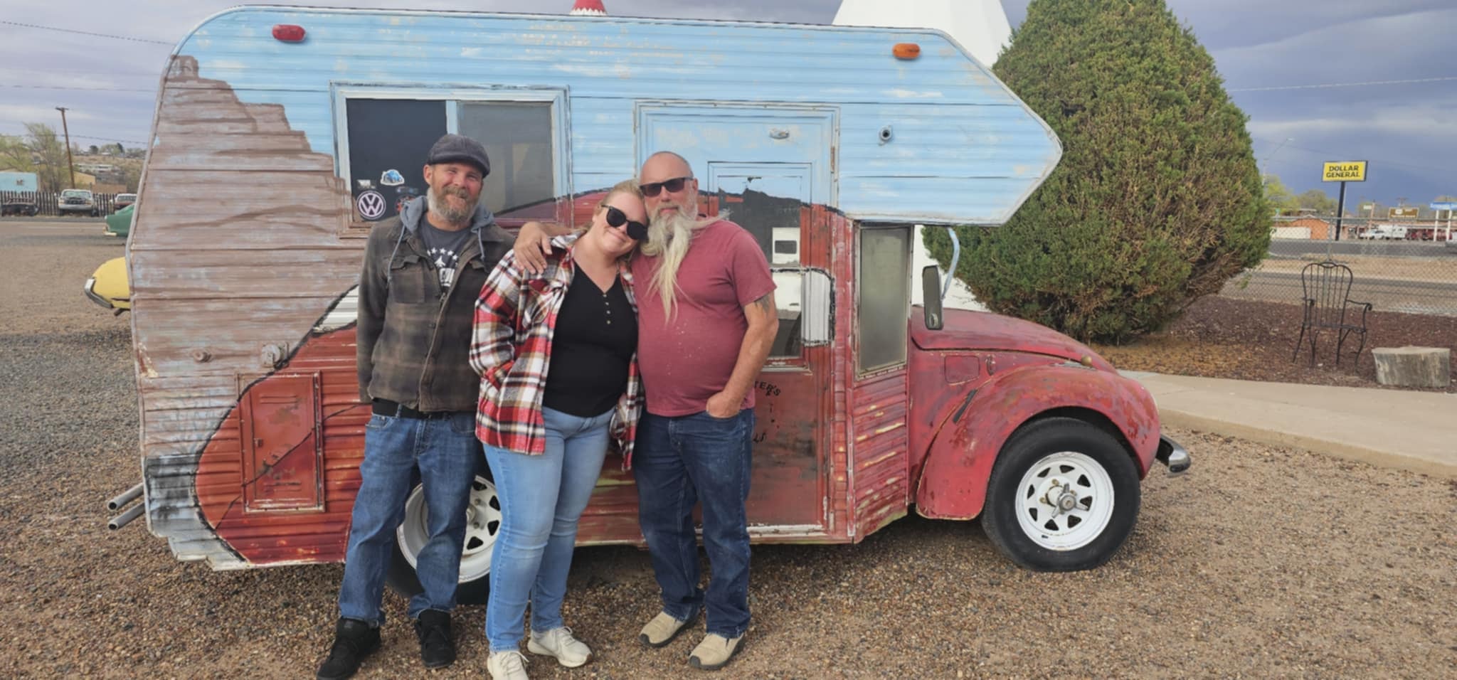 Ben, Shelby, and Joe in front of the vintage camper art car at the Wigwam Motel in Holbrook