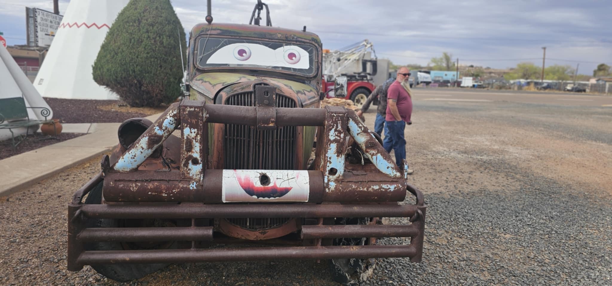 Rusty Mater-style truck with cartoon eyes at the Wigwam Motel in Holbrook, Arizona