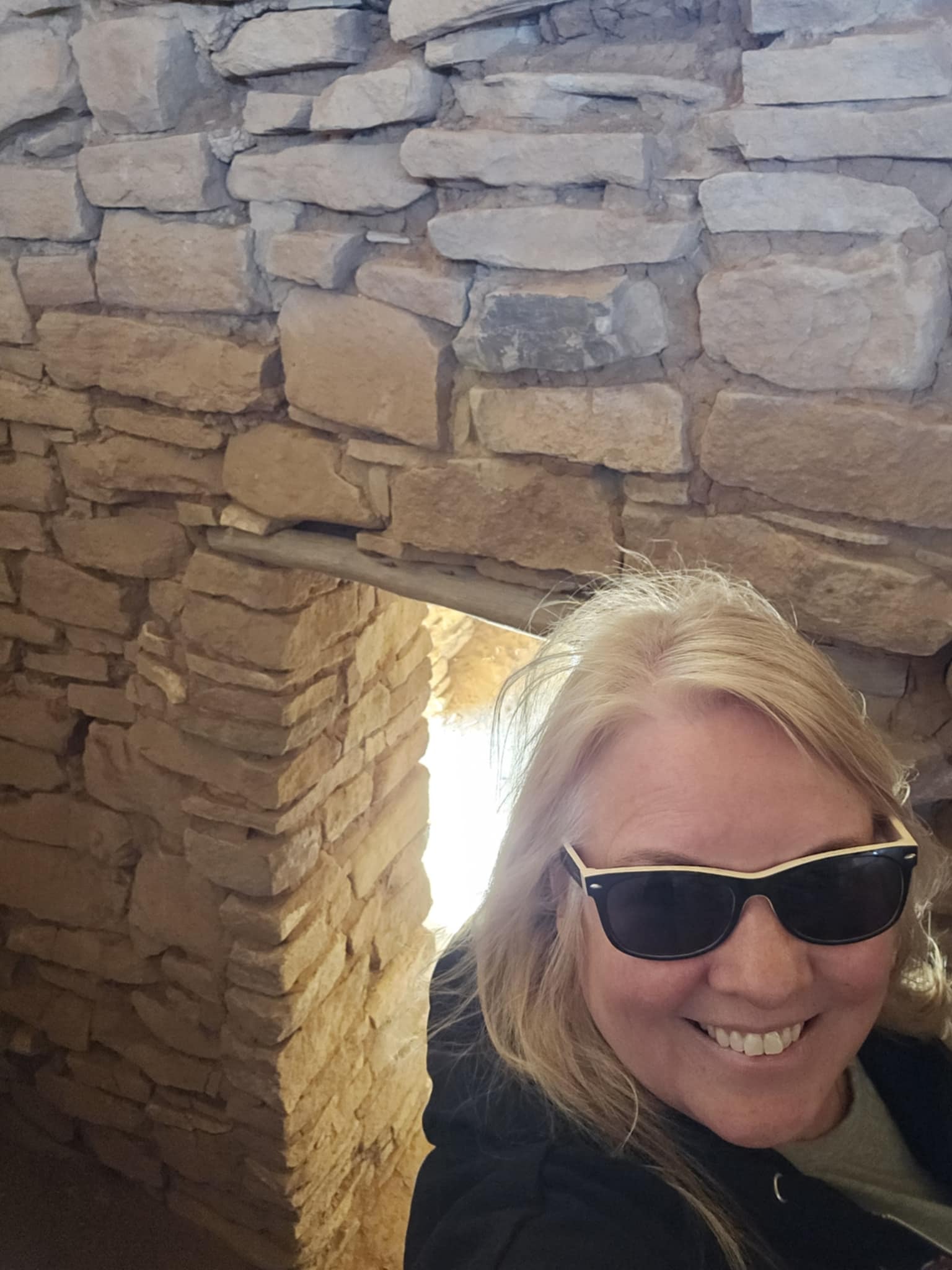 Tina selfie inside ancient stone ruins at Canyons of the Ancients National Monument Colorado