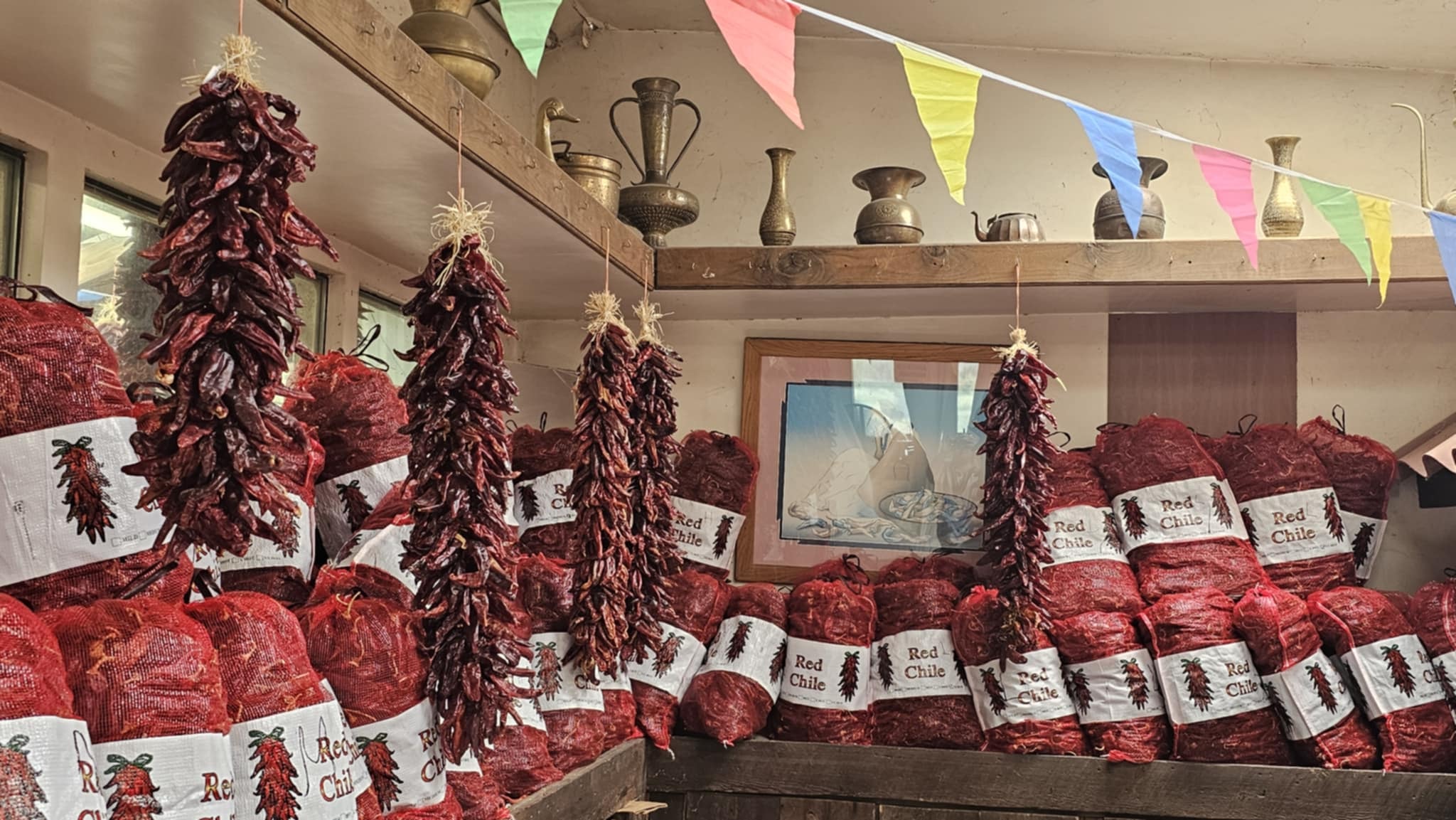 Red chile shop interior packed with ristras and chile products at the Hatch Chile Festival