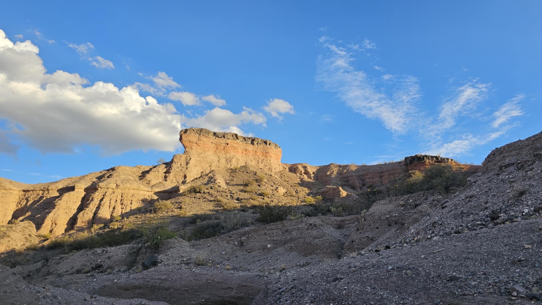 Wide view of the desert butte landscape at Robledo Slot Canyon