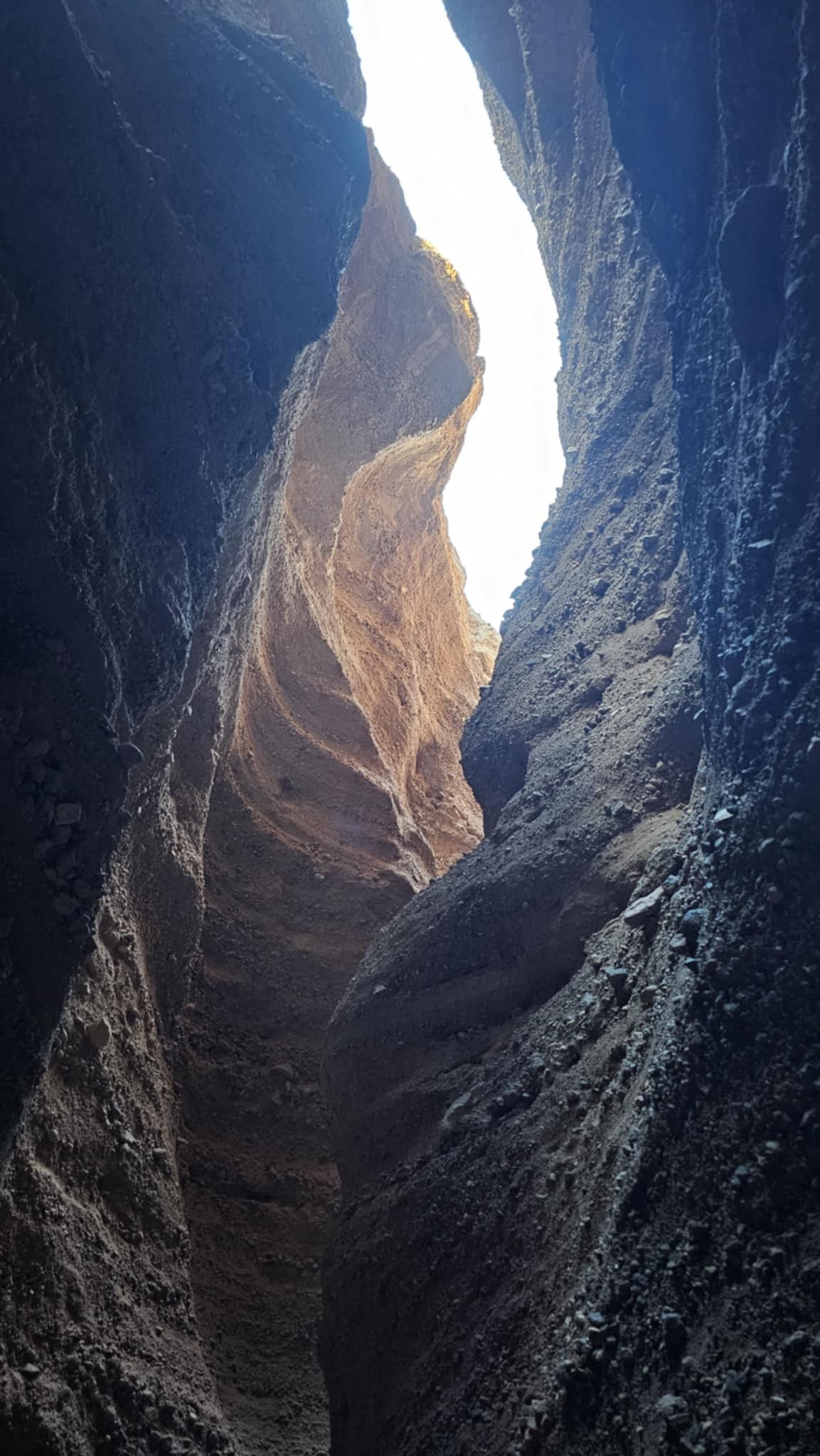 Looking up through the narrow slot at Robledo Slot Canyon