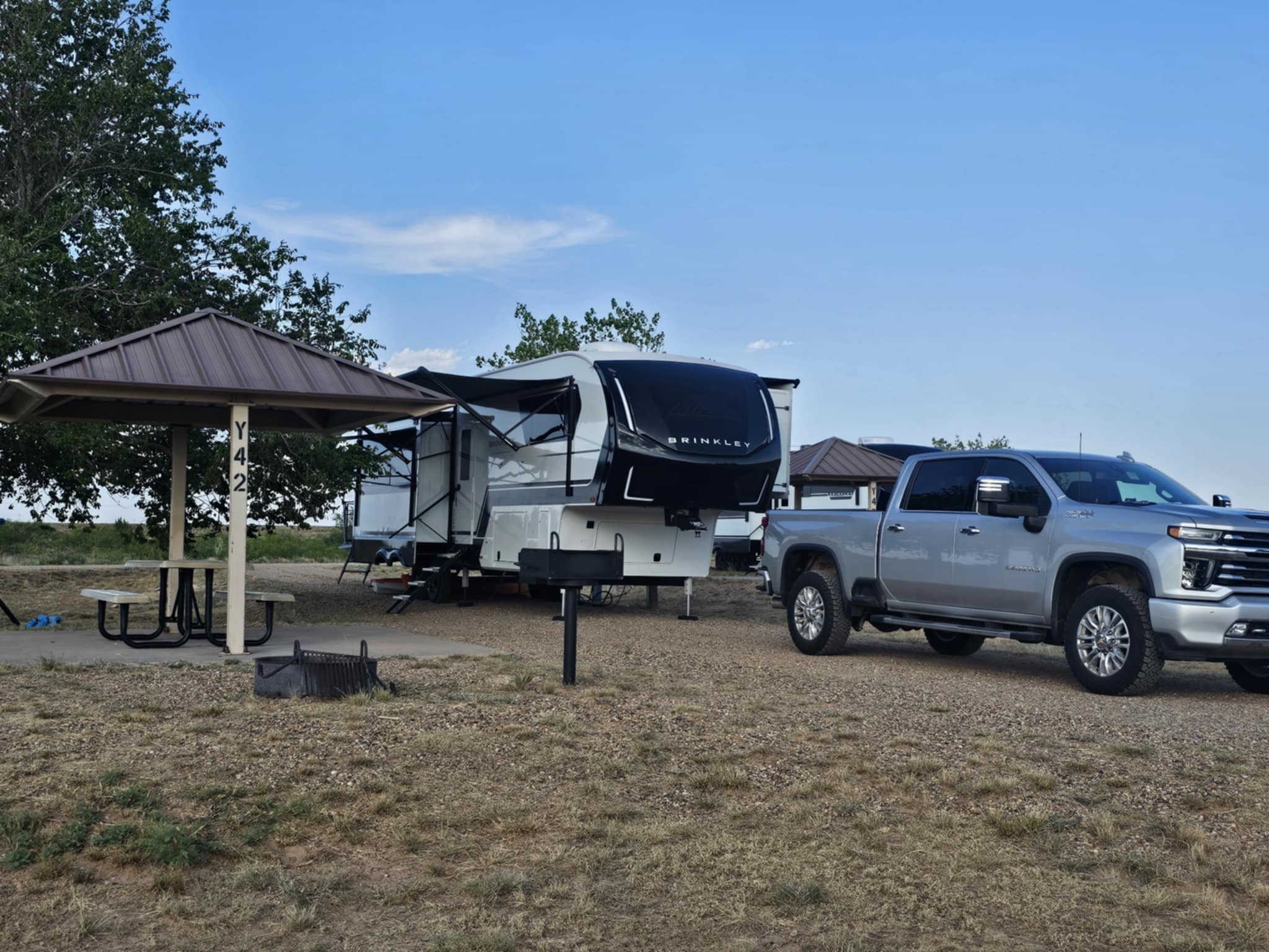Brinkley Z3400 set up at Ute Lake State Park with a covered picnic shelter and blue New Mexico sky overhead