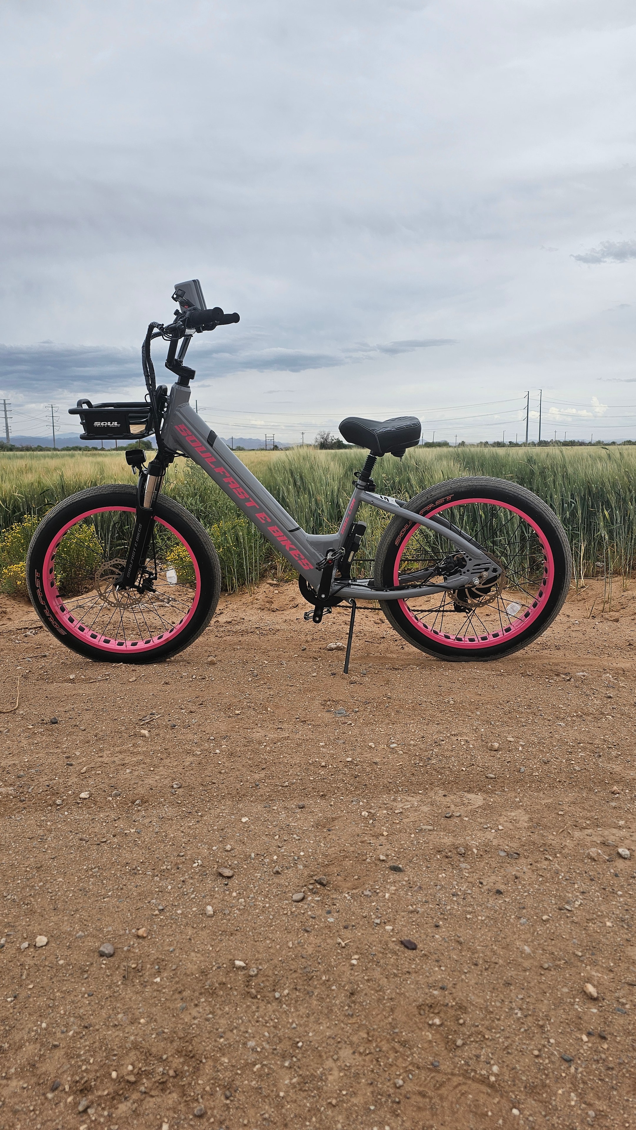 Pink Soul Fast e-bike on a dirt road under an open sky
