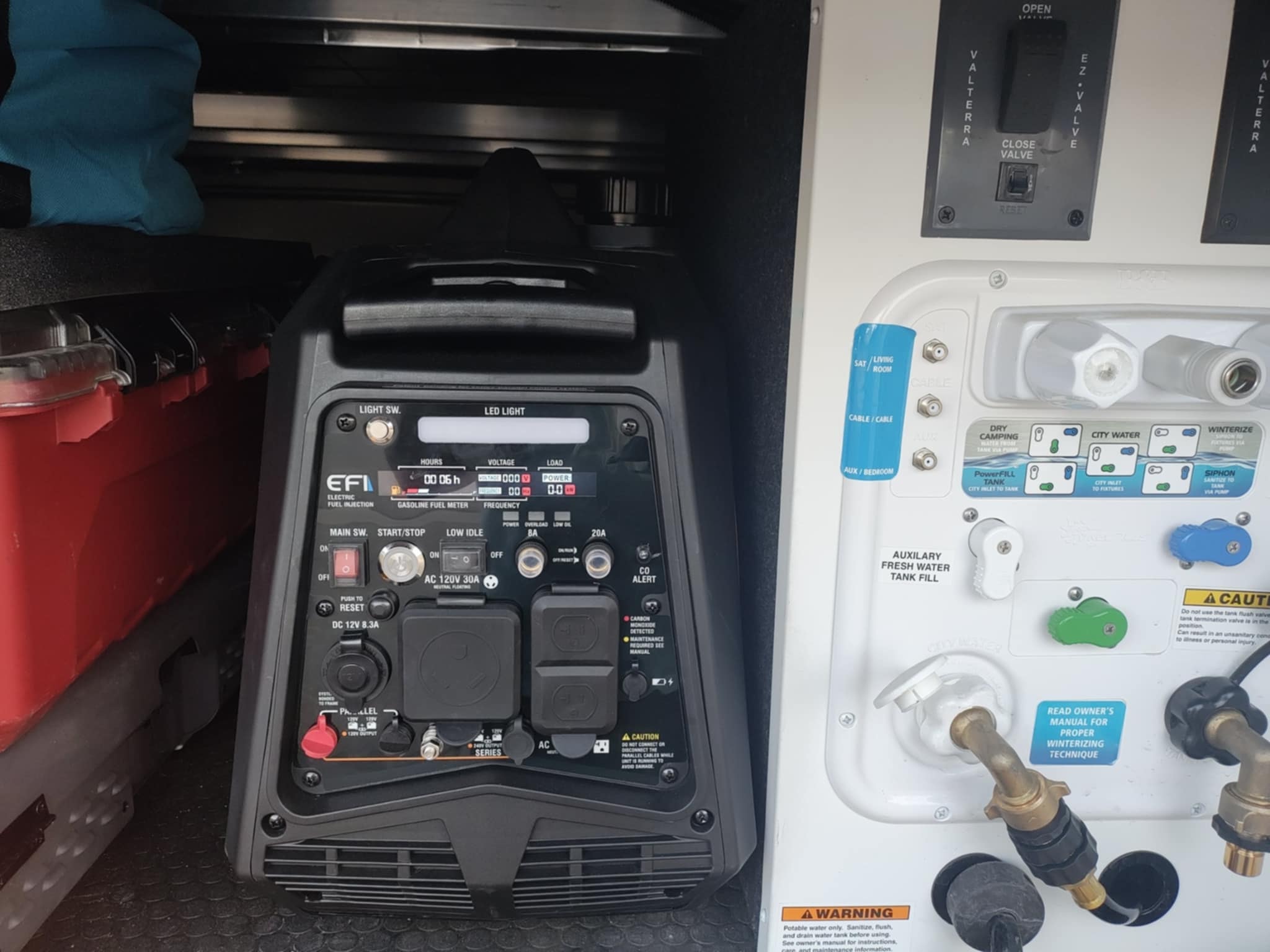 Genmax generator control panel and Brinkley water system panel in the basement