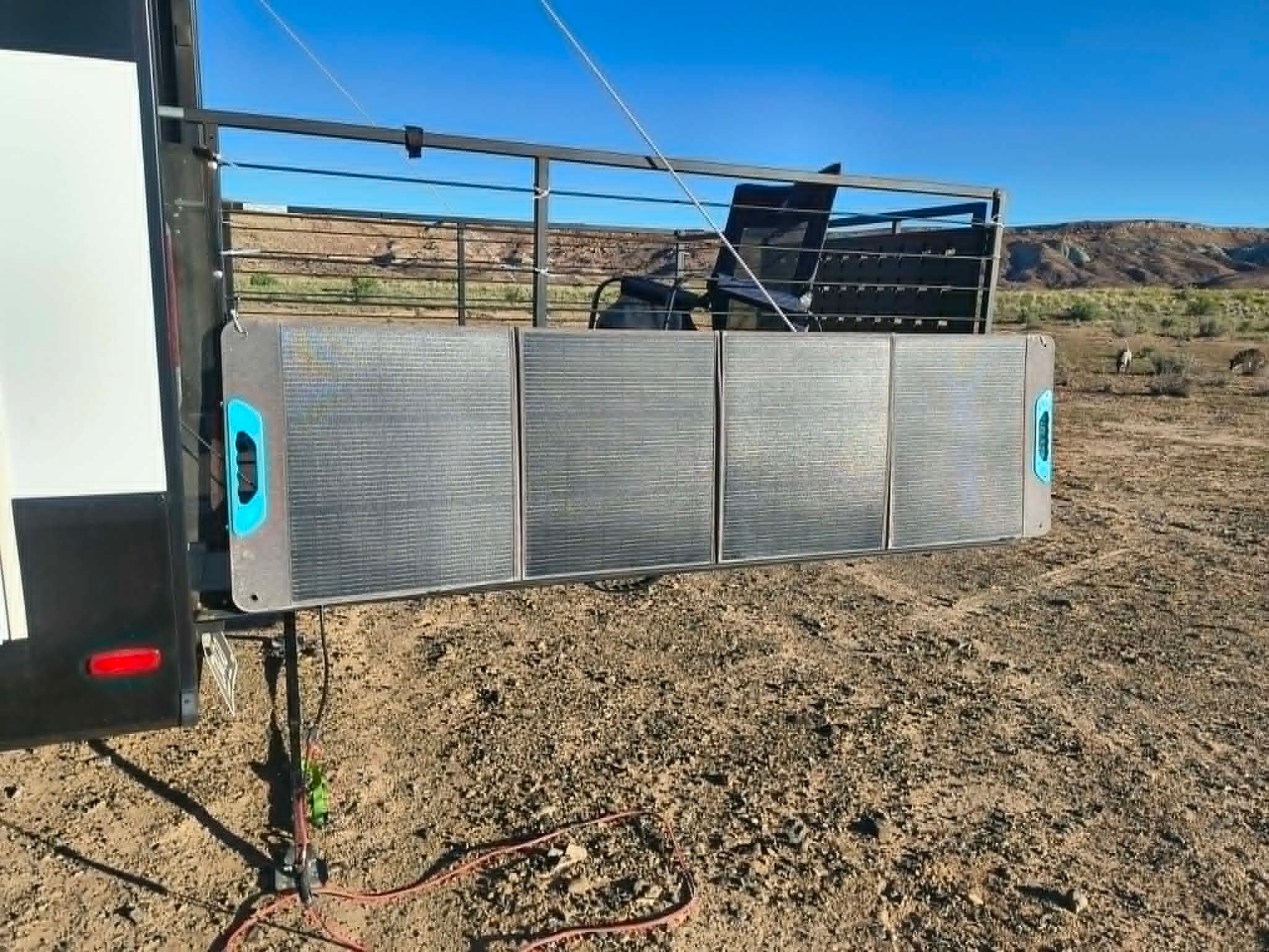Portable solar panel deployed beside the Brinkley Z3400 in the desert