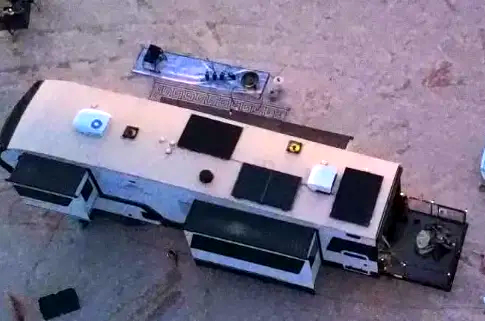 Aerial view of the Brinkley Z3400 roof showing solar panels and Starlink dish